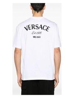 Hey there. If you’re on the hunt for a versatile and stylish tee, this might just be the one for you. It’s a staple from the Versace clothing line, combining comfort with a dash of luxury. Crafted from 100% cotton for that soft, breathable feel. Features a simple crew neckline and short sleeves for classic style. Embroidered logo adds a touch of vibrancy to your look. Exclusive Versace Milano stamp at the back for a luxe finish. Authenticity QR code to ensure it’s the real deal. | Versace Men's Stamp Embroidery, Versace T Shirt, Versace Logo, Cotton T Shirt, Versace, Stamp, Embroidery, T Shirt, White