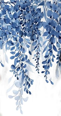 watercolor painting of blue leaves on white paper