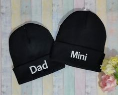 "-----The price is for two machine embroidered beanies----- QUALITY:    100% Polyacrylic (Soft-Touch) Double layer knit Cuffed design Dimensions: Adults: 20 x 30 cm (7.87\" x 11.81\") Kids: 18 x 24 cm (7.09\" x 9.45\")" Cotton Beanie Cap With Letter Print, Cotton Beanie With Letter Print, Black Embroidered Beanie For Winter, Black Embroidered Beanie, One Size Fits Most, Black Embroidered Beanie One Size, Cotton Winter Hat As A Gift, Cotton Winter Hat For Gift, Winter Cotton Hat For Gifts, Cotton Winter Hat As Gift