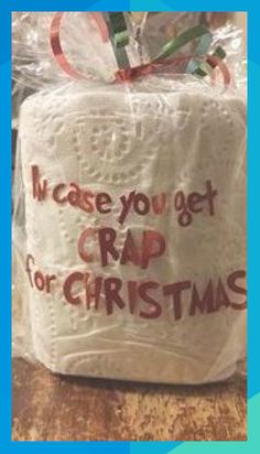 a toilet paper roll wrapped in plastic with the words crap for christmas written on it