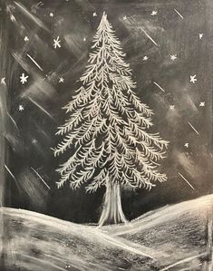 a chalkboard drawing of a christmas tree on a snowy hill with stars in the sky