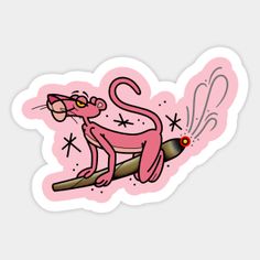 a pink sticker with an image of a cat sitting on top of a tree branch