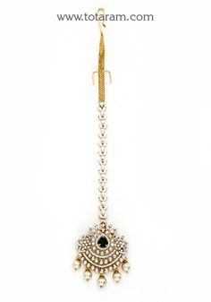 18 karat gold "detachable" diamond maang tikka cum pendant - papidi billa with color stones & south sea pearls
  this product can be used as pendant.
  this product has inter changeable stones in the pendant. 
  gross weight of the pendant without chain : 11.000 grams
  gross weight of the diamond tikka chain without pendant : 5.200 grams
  length of the pendant : 1.85 inches
  width of the pendant :  1.20 inches
 - 235-GT482 - in 16.200 Grams for USD $3,715.33 USD. 
Made in India by Totaram Jew Elegant Hand Set Tikka For Ceremonial Occasion, Elegant Hand Set Ceremonial Tikka, Elegant Ceremonial Hand Set Tikka, Elegant Formal Tikka With Tilla Details, Designer Gold Jewelry For Reception, Elegant Bridal Necklace With Latkans For Ceremonial Occasions, Elegant Ceremonial Tikka With Latkans, Elegant White Tikka For Reception, Elegant Tikka With Latkans For Reception