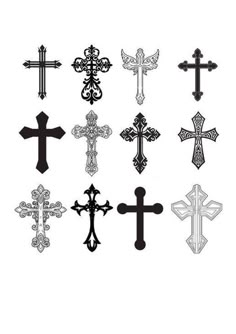 cross tattoo designs on white paper with black and white ink, including the symbols for different crosses