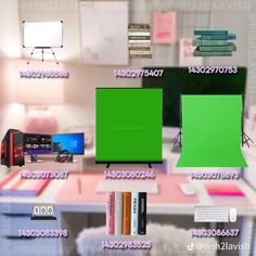 there are many different types of televisions on the table and in front of them is a green screen