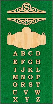 wooden alphabet and numbers on green paper with clippings to cut out the letters