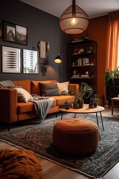 a living room with an orange couch, coffee table and bookshelf in the corner