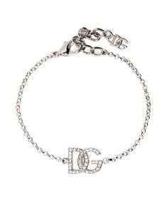 crystal-embellished logo-charm bracelet from DOLCE & GABBANA featuring silver-tone, logo charm, crystal embellishment, lobster claw fastening and adjustable fit. Silver Bracelet Stack, Xoxo Jewelry, Fire Jewelry, Designer Silver Jewellery, Crystal Bangle, Girly Accessories, Expensive Jewelry