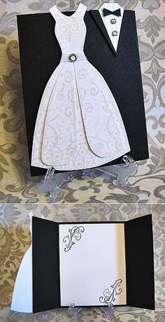 two cards with black and white paper, one in the shape of a bride's dress