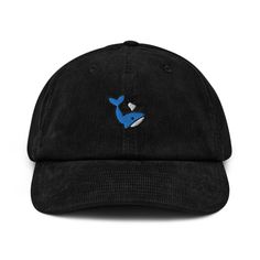 Our Whale Hat is crafted with quality and attention to detail in mind. The six-panel design is constructed with durable materials, ensuring long-lasting wear. The hat's embroidered design is carefully crafted with precision, giving you a unique and eye-catching accessory that's perfect for any casual occasion. * 100% cotton corduroy * Soft, unstructured crown * Cotton twill sweatband and taping * Adjustable buckle 🌿 Eco-Friendly Production ✈️ Ships Internationally 🎁💝 Beautiful gift for Friend Cute Streetwear Cap, Cute Black Snapback Baseball Cap, Cute Black Baseball Cap With Curved Brim, Embroidered Black Cotton Hat, Black Novelty Cotton Hat, Navy Embroidered Cap, Blue Embroidered Snapback Baseball Cap, Novelty Baseball Cap For Streetwear, One Size, Embroidery Cute