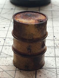 three metal containers stacked on top of each other