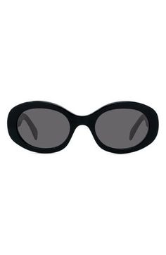 A sleek oval silhouette elevates Italian-made sunglasses fitted with scratch-resistant CR-39 lenses. 52mm lens width; 22mm bridge width; 145mm temple length 100% UV protection CR-39 lenses Acetate Made in Italy Black Oval Sunglasses With Gradient Lenses, Oval Black Sunglasses With Gradient Lenses, Italian Sunglasses, Celine Triomphe, Eyewear Womens, Oval Sunglasses, Eyewear Sunglasses, Solid Black, Uv Protection