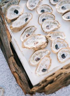 an old wooden box filled with oysters