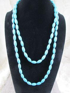 Great turquoise necklace measuring 46" long, no clasp. just slide it over your head. Can be worn long, or double it up, knot it, add more chains/ropes...make the look your own! Beautiful blue faux turquoise done in a barrel shape design. Simple, yet statement makingso versatile. LOW pricing. How To Make Rope, Necklace Turquoise, Southwestern Jewelry, Jewelry Statement, Rope Necklace, Necklace Blue, Design Simple, Shape Design, Beautiful Blue