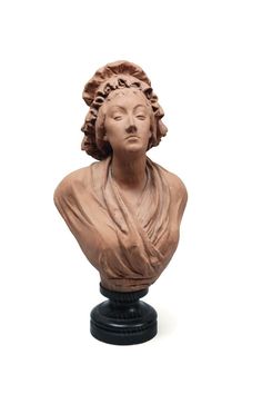 a clay busturine of a woman's head