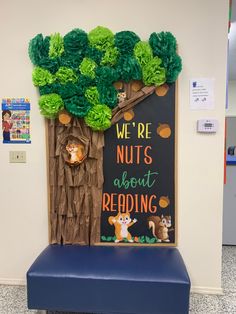 Children’s area library bulletin board Reading Lab Classroom Decor, Tree Library Display, Nuts About Reading Bulletin Board, Reading Room Door Decoration, We're Nuts About Fall Bulletin Board, Preschool Reading Bulletin Boards, Preschool Library Bulletin Board Ideas, Library School Decoration, Classroom Library Wall Decor