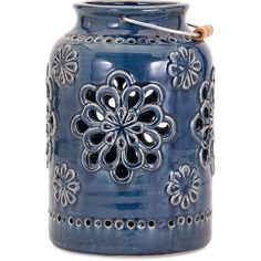 a blue vase with an intricate design on it