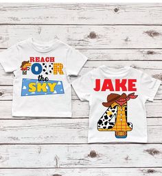 two children's t - shirts with cartoon characters printed on the front and back