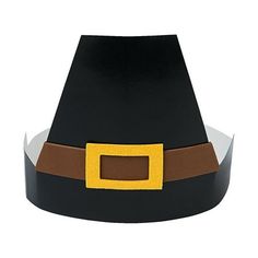 a black and brown hat with a yellow buckle on the top is sitting in front of a white background