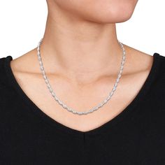 Give your look a sophisticated update with this slim and elegant oval-shaped multi-diamond alternating bead necklace. Fashioned in sterling silver Dainty oval-shaped composites of diamonds and beaded details shine between grooved barrel beads. Captivating with 1/2 ct. t.w. of diamonds This 17.0-inch necklace secures with a tongue and groove clasp. Oval Sterling Silver Diamond Necklace, Elegant Sterling Silver Jewelry With Oval Beads, Formal Silver Jewelry With Oval Beads, Silver Oval Beads Jewelry For Formal Occasions, Elegant Formal Jewelry With Oval Beads, Black Friday Specials, Peoples Jewellers, Tongue And Groove, Bead Strand