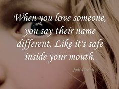 a close up of a person's face with the words when you love someone, you say their name different like it's safe inside your mouth