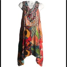 Beautiful Patchwork Design. Rayon Fabric, Made In India. Pit To Pit Is 20 Or 40 Around. Waist Is 26 Inches Or 52 Around. Hips Measure 35 Inches Or 70 Around Casual Multicolor Free Size Dress, Casual Multicolor Dress, Casual Sleeveless Midi Dress With Vibrant Print, Bohemian Sleeveless Midi Dress In Multicolor Print, Casual Sleeveless Midi Dress With Colorful Pattern, Bohemian Sleeveless Multicolor Midi Dress, Orange Sleeveless Patchwork Dress, Multicolor Patchwork Sleeveless Midi Dress, Multicolor Sleeveless Patchwork Midi Dress