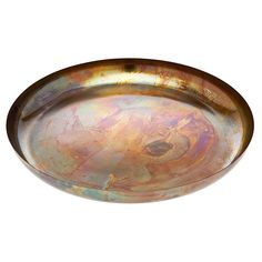 an oval metal tray on a white background