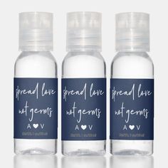 three bottles with labels on them that say,'we are proud love not germs '