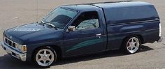 a blue van parked in a parking lot