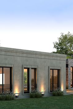 an artist's rendering of a modern house with lights on the windows and doors