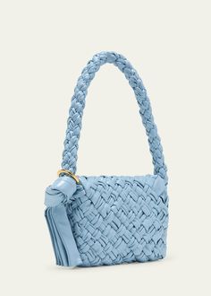 "Find BOTTEGA VENETA Kalimero Citta Bag on Editorialist. The Bottega Veneta Kalimero Citta crossbody bag is crafted from woven leather. It features a knot accent shoulder strap, a flap top with a magnetic closure, and an approximate dimension of 7\"H x 9.8\"W x 2.2\"D. This bag is made in Italy." Black And Brass, 7 H, Magnetic Closure, Bottega Veneta, Knot, Crossbody Bag, Shoulder Strap, Tops Designs, In Italy