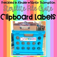 a blue crate sitting on top of a rainbow striped floor next to a sign that says create file gate clipboard labels