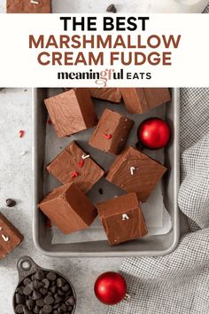 the best marshmallow cream fudge is made with chocolate and topped with cherries