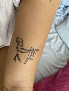 a person with a tattoo on their arm