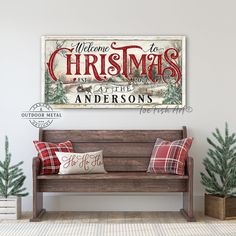 a wooden bench sitting in front of a christmas sign