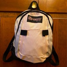 Cute Off-Brand Jansport Backpack. Backpack Has Two Pockets With A Smaller Pocket Within Each One. Inside Is Made Of Nylon And The Outside Is Made Of A Stronger, Water Repellent, Canvas Material. Item Is In Great Condition And Nearly Brand New Besides Some Tiny Discoloration On The Front That Is Barely Noticeable (Photo #3) And Underneath The Flap (Photo #4) Casual Sports Backpack With Adjustable Strap, Casual Backpack For Gym And Back To School, Casual Gym Backpack For Back To School, Sporty Pink Backpack For Sports, Casual Sports Backpack For Back To School, Pink Nylon Gym Backpack, Pink Sporty Gym Backpack, Sporty Pink Gym Backpack, Pink Casual Backpack For Gym