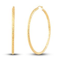 Dynamic round tubes are embellished with distinctive diamond-cut patterns in these stylish women's hoop earrings. Fashioned in 14K yellow gold, the earrings secure in place with hinged backs. Luxury 14k Gold Hoop Earrings With Diamond Cut, Luxury Diamond Cut 14k Gold Hoop Earrings, Luxury 14k Gold Diamond Cut Hoop Earrings, Elegant Textured Jewelry For Anniversary, Luxury Yellow Gold Diamond Cut Hoop Earrings, Textured Gold Plated Yellow Gold Jewelry, Elegant Hammered Round Hoop Earrings, Textured Gold-plated Yellow Gold Jewelry, Elegant Hammered Hoop Earrings