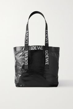 Loewe's practical tote is ideal for both everyday errands and weekend travel. Sized to hold a 13" laptop, it's made from the label's lightweight 'paper' leather and has double logo-jacquard webbing handles so you can carry it by hand or over the shoulder. It folds flat for easy storage, too. Bag Editorial, Paper Leather, Woven Leather Tote, Laptop Brands, Loewe Bag, Weekend Travel, Tote Pattern, Shopper Tote, Distressed Leather