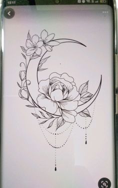 a drawing of a flower on the back of a cell phone with an image of a crescent