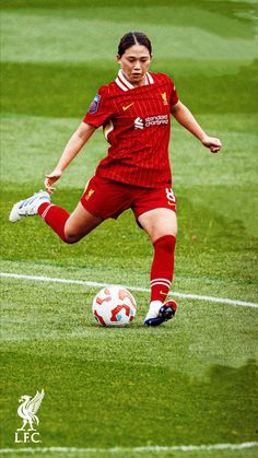 a female soccer player in action on the field