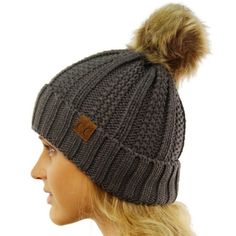 We are adding a little cold weather fun to our most loved C.C beanie. These pom beanies have an added pom on the top of them are lined on the inside. They are comfy, warm, and oh so cozy. The little leather tag is stamped with a registered C.C Size: One Size.  Color: Gray.  Gender: unisex.  Age Group: adult. Soft Knit Winter Hats For Fall, Warm Snug Hats For Fall, Soft Knit Hat For Fall And Winter, Warm Bonnet Cap For Fall, Warm Fall Bonnet Cap, Warm Snug Beanie For Fall, One Size Beanie For Winter Cold Weather, One Size Beanie For Winter, Cozy One Size Winter Beanie