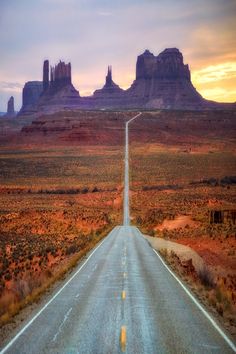 an empty road in the middle of nowhere