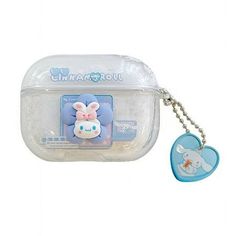 a plastic case with a keychain attached to it and a cartoon character on the front