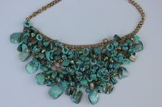 This unique jewelry necklace is in my house since 1970s. It would be nice gift for every woman for every occasion. Not of precious metal, or of precious stones, but of character and style. It is carried by my mother, then by me, corrected several times. Elegant Turquoise Necklace For Gift, Metal Bib Necklace For Costume Jewelry Gift, Metal Bib Necklace As Costume Jewelry Gift, Turquoise Gemstone Jewelry For Party, Bohemian Jeweled Dangle Necklaces, Costume Jewelry Pendant With Stones, Vintage Turquoise Jewelry With Stones, Bohemian Gemstone Necklace For Party, Vintage Turquoise Stone Jewelry