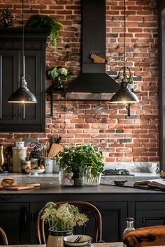 a kitchen with brick wall and wooden table in the foreground, potted plants on the counter