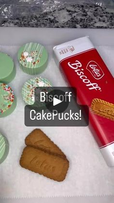 some cupcakes and cookies are sitting on the counter