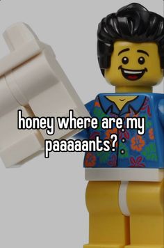 a lego man holding a piece of paper with the words honey where are my paaaants?