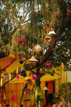 an image of a tree with decorations hanging from it