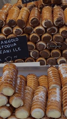 many different kinds of pastries are on display