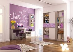 a bedroom with purple walls and white furniture